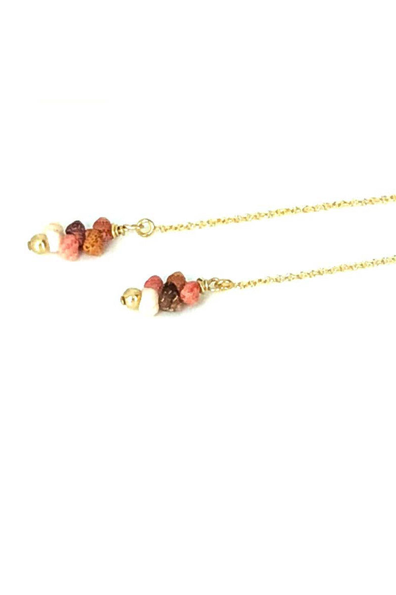 Necklace with colorful beads on a white background
