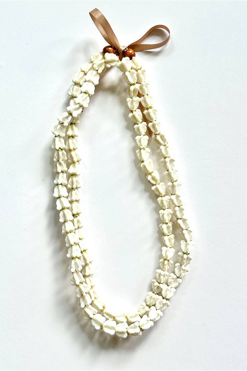 CalikaiWhiteCrownFlowerLei21.jpg