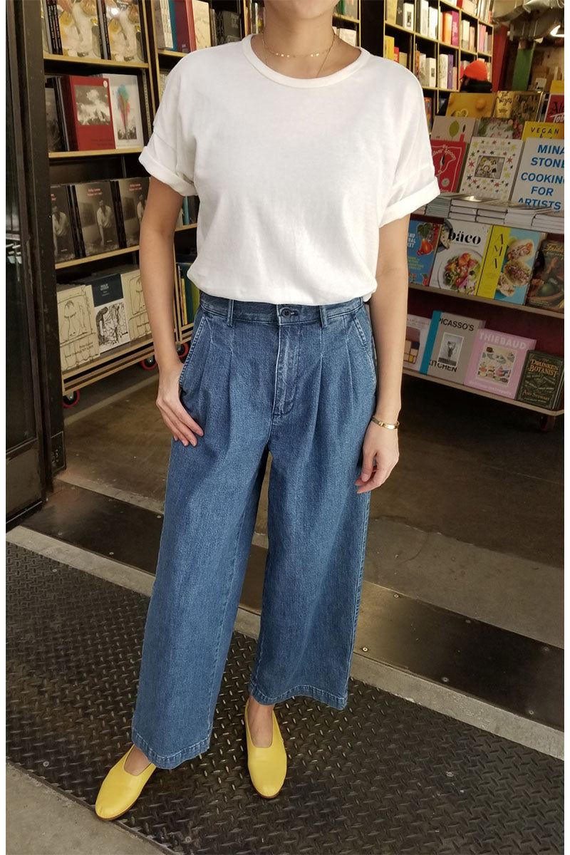 Her Tee