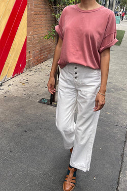 Her Tee