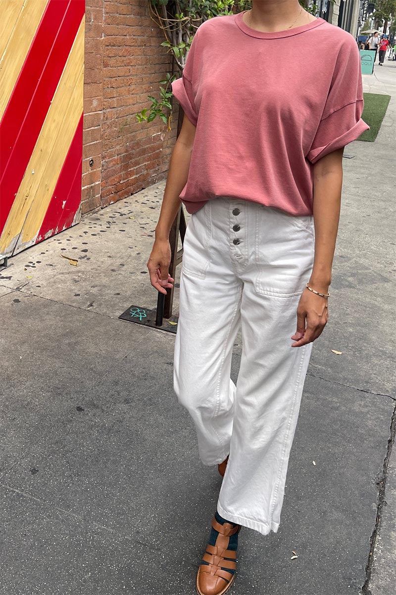 Her Tee
